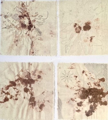 The same four napkins with line drawings added around the marks
